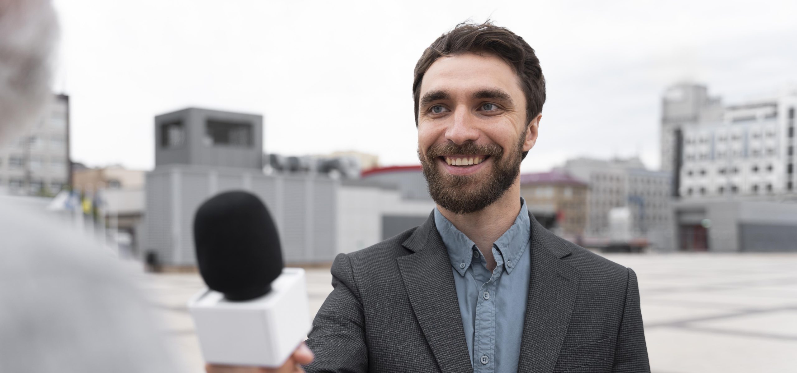 journalist taking interview from man